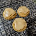 Frosted cookies in a wire rack